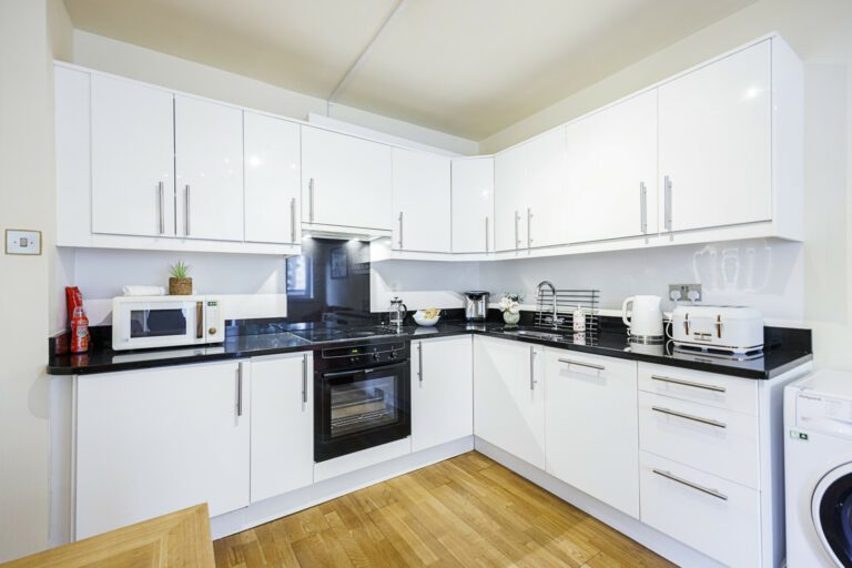 A fully equipped kitchen with modern appliances and ample counter space, providing everything you need for culinary adventures and entertaining